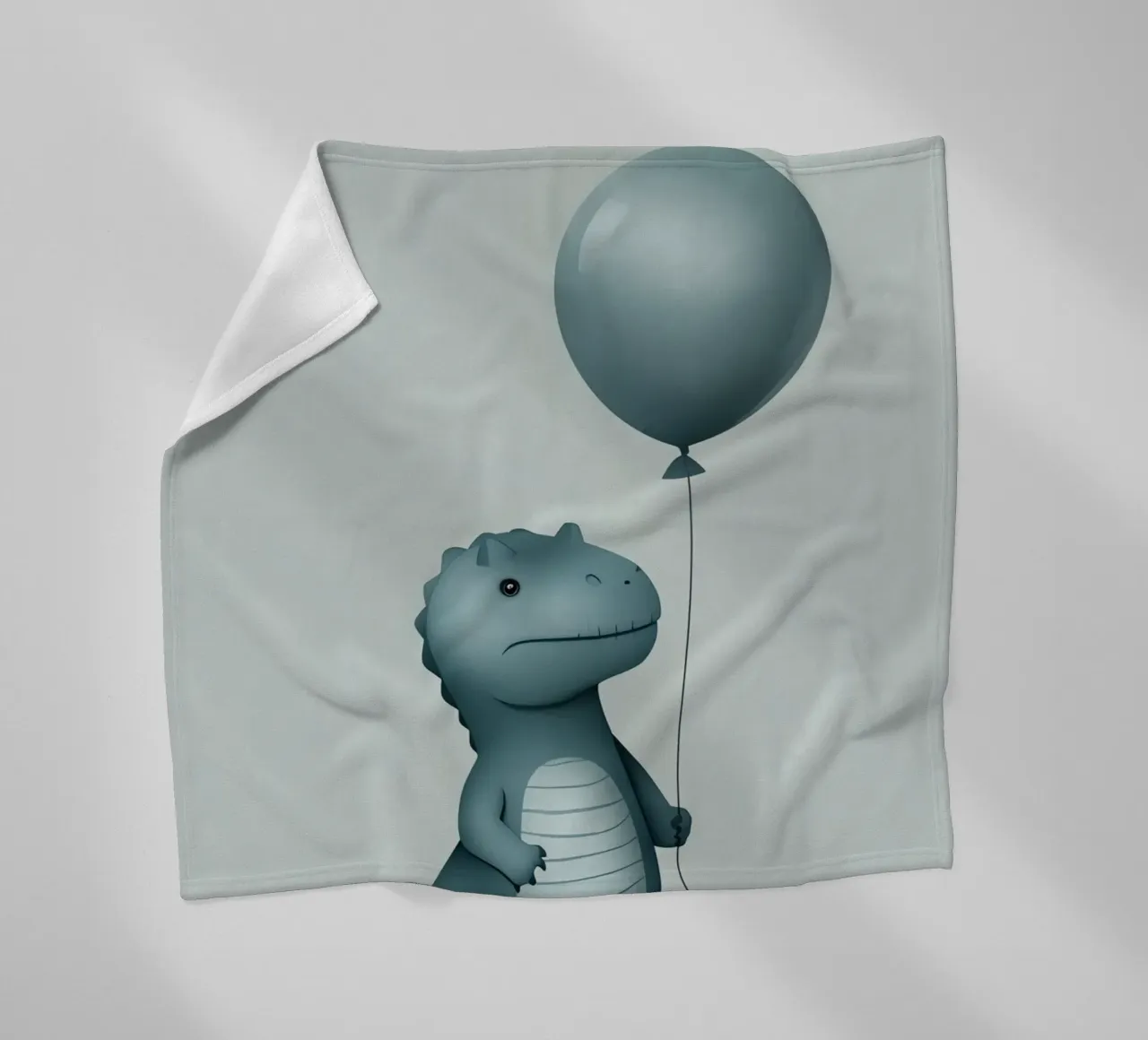 Dinosauro con in mano un palloncino coperta in pile da DesignDoodle