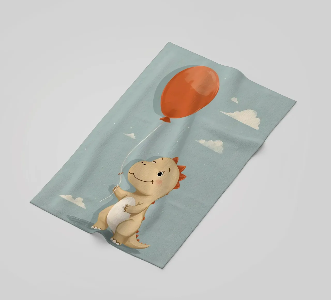 Dinosauro che tiene in mano un palloncino arancione con le nuvole telo mare da DesignDoodle