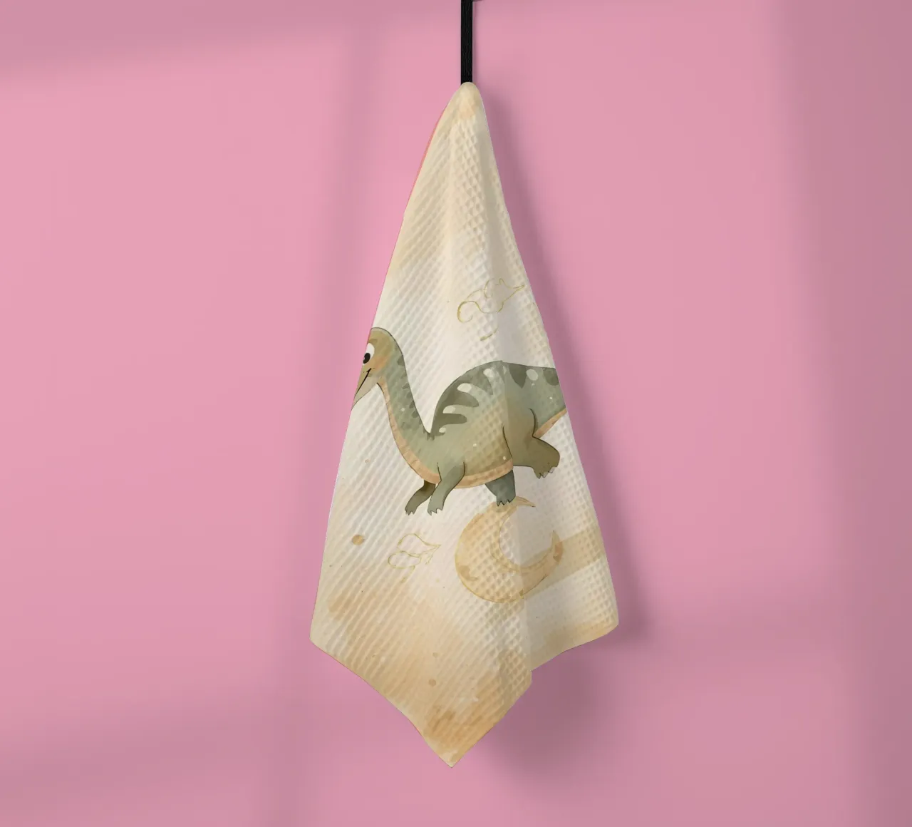 Un mignon dinosaure en équilibre sur un croissant de lune torchon de DesignDoodle