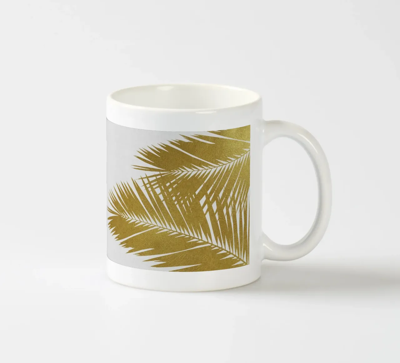 Oro a foglia di palma II tazza in ceramica da Orara Studio