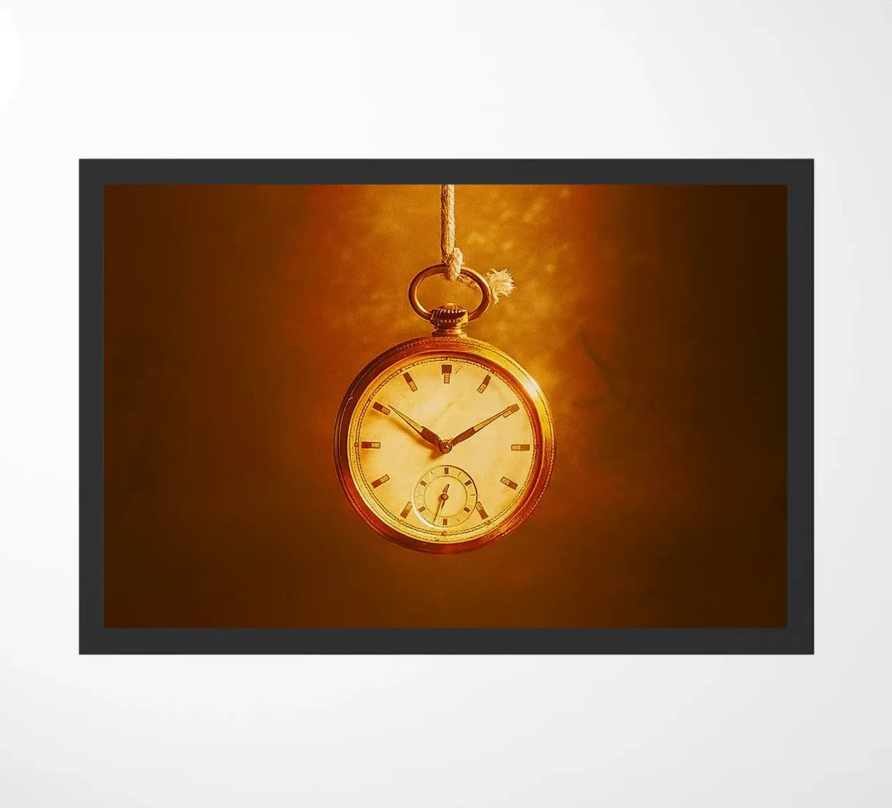 a clock hanging on a nearly broken string doormat by PASMING
