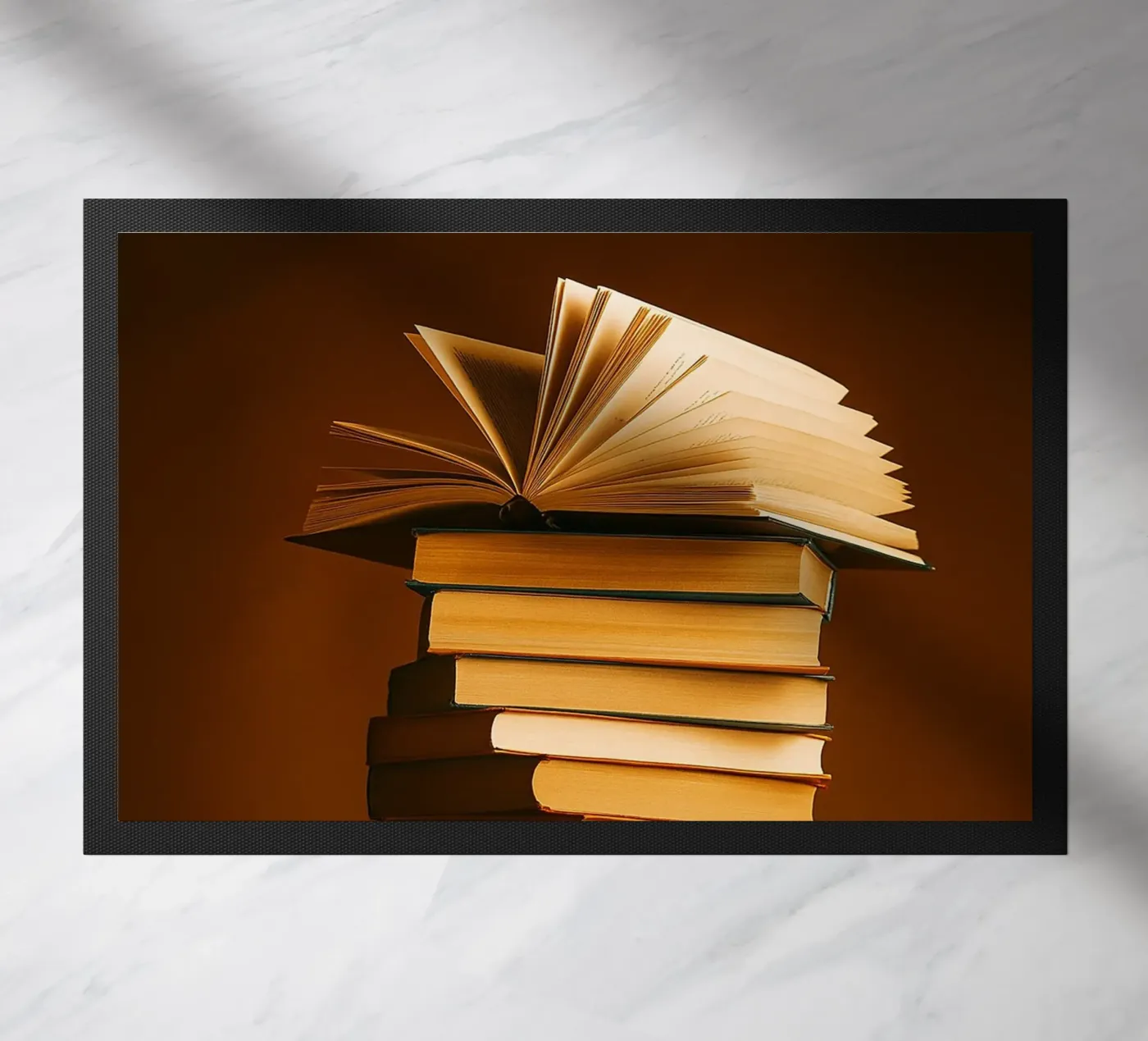 libri impilati zerbino da PASMING