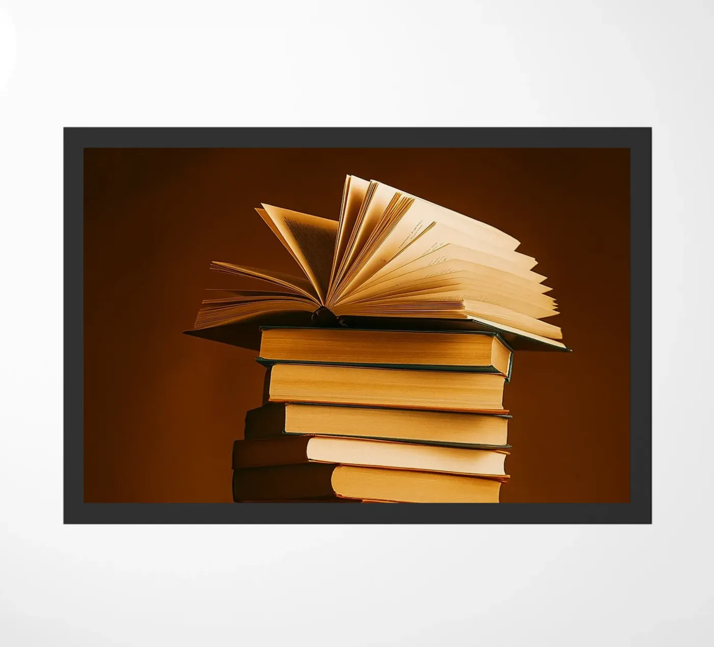 libri impilati zerbino da PASMING