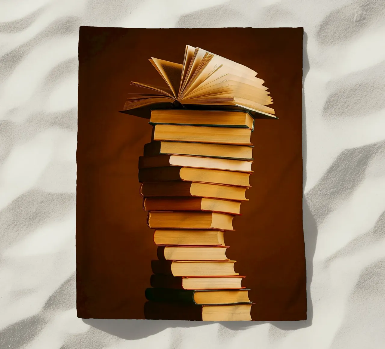 libri impilati telo mare da PASMING