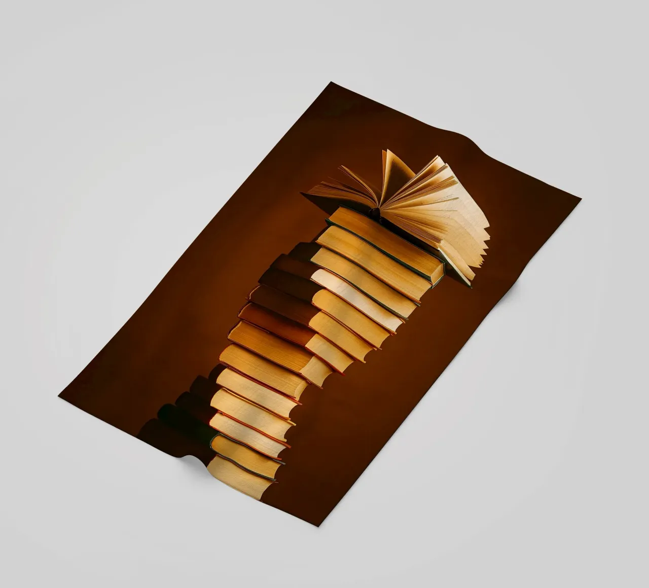 libri impilati telo mare da PASMING