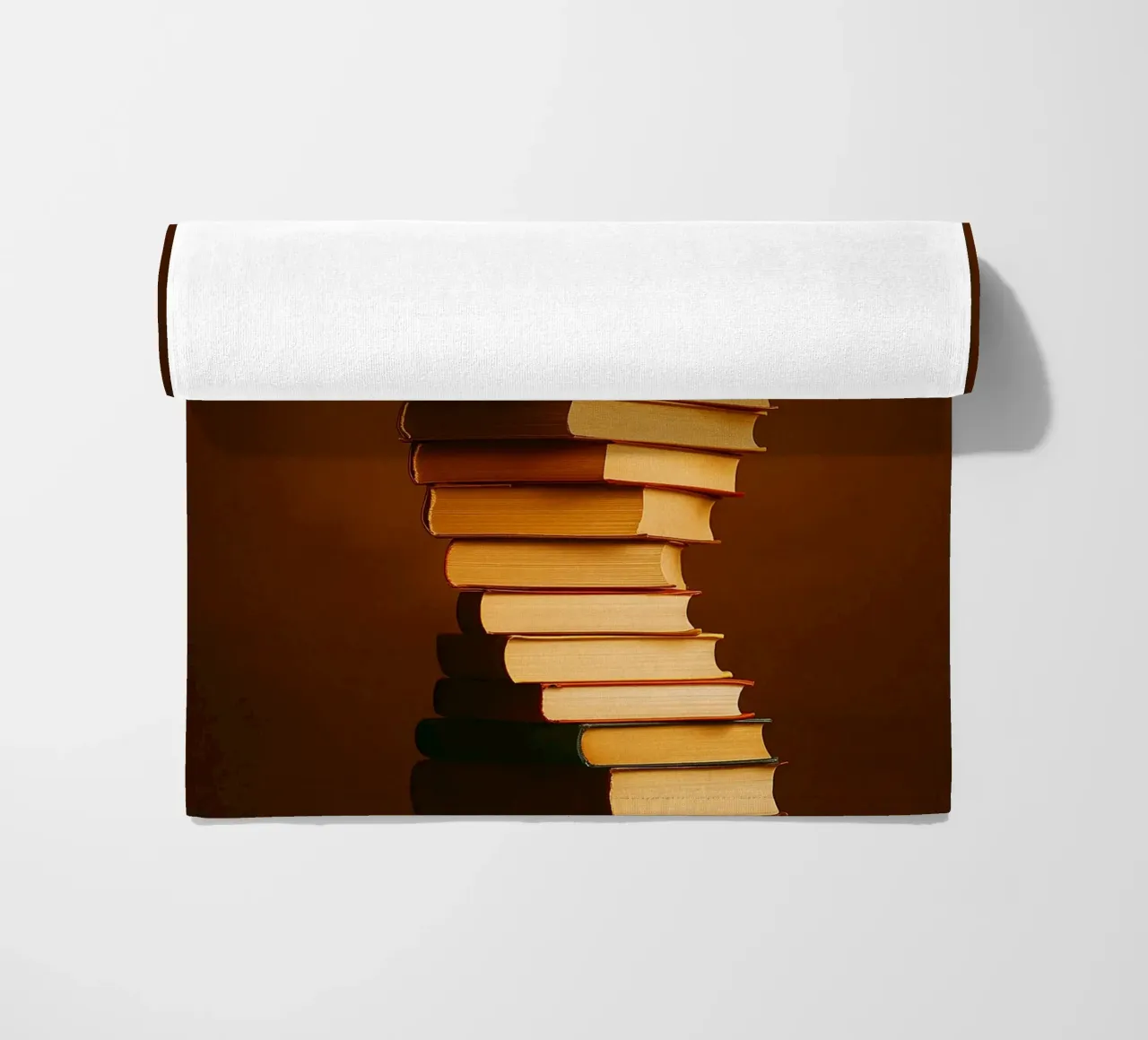 libri impilati telo mare da PASMING