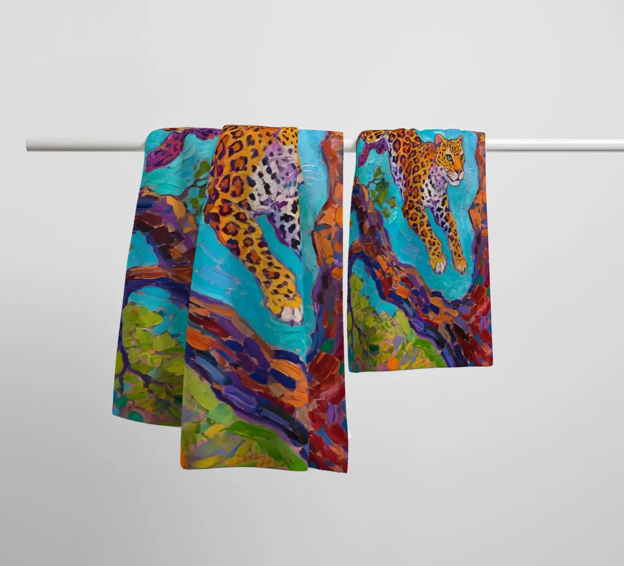 Leopard jumping between tree towel by Slash Shop