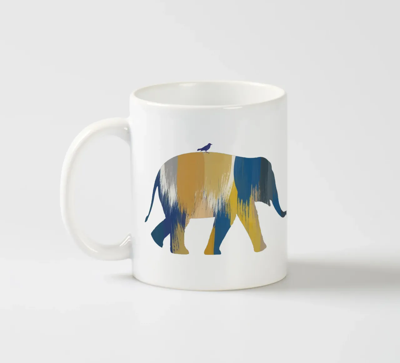 Eléphant bleu et jaune mug en céramique de Orara Studio