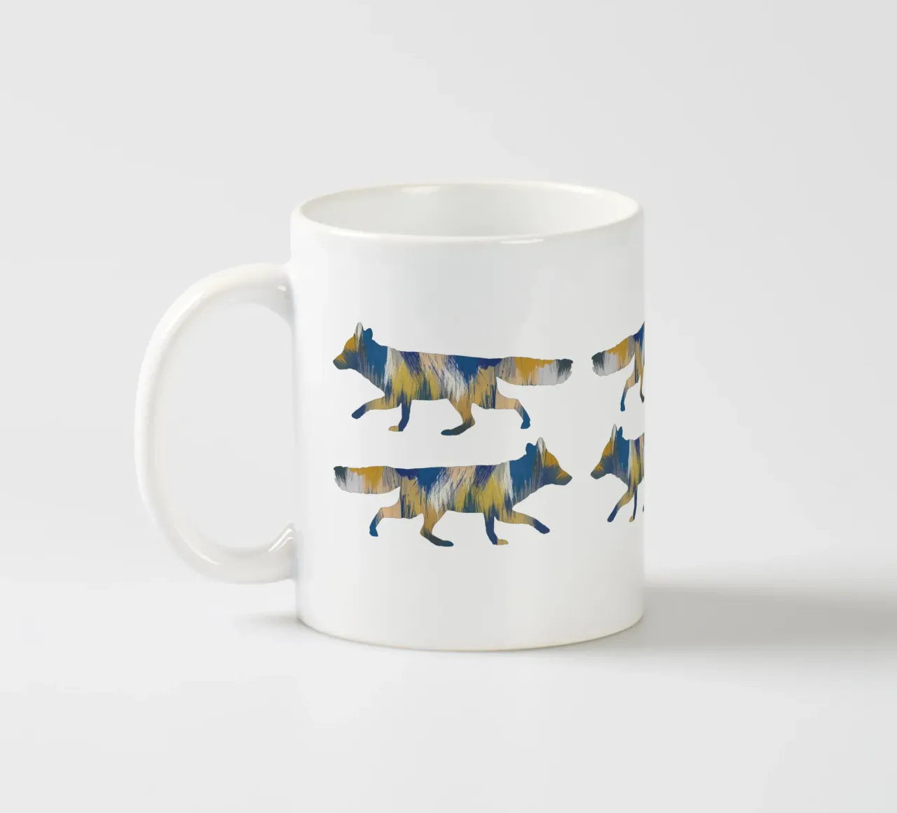 Volpe blu e gialla tazza in ceramica da Orara Studio
