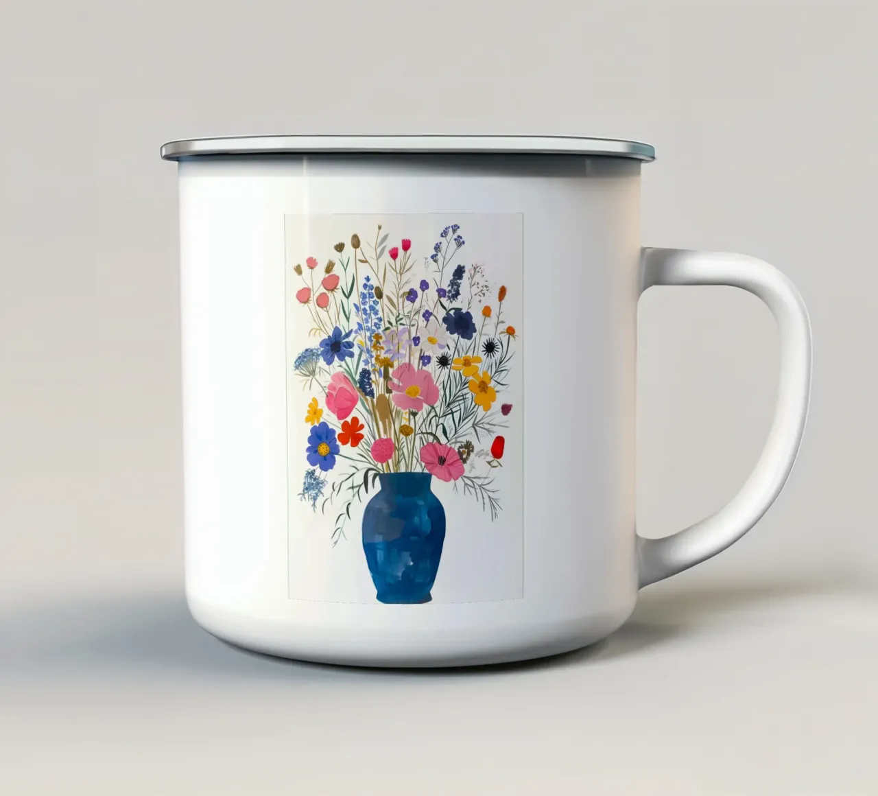 Fiori di campo colorati in un vaso blu tazza in smalto da Cozy Vibes