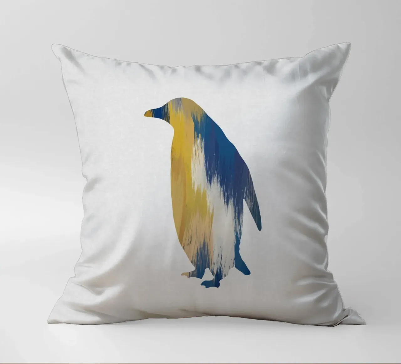Pingouin bleu et jaune coussin de Orara Studio