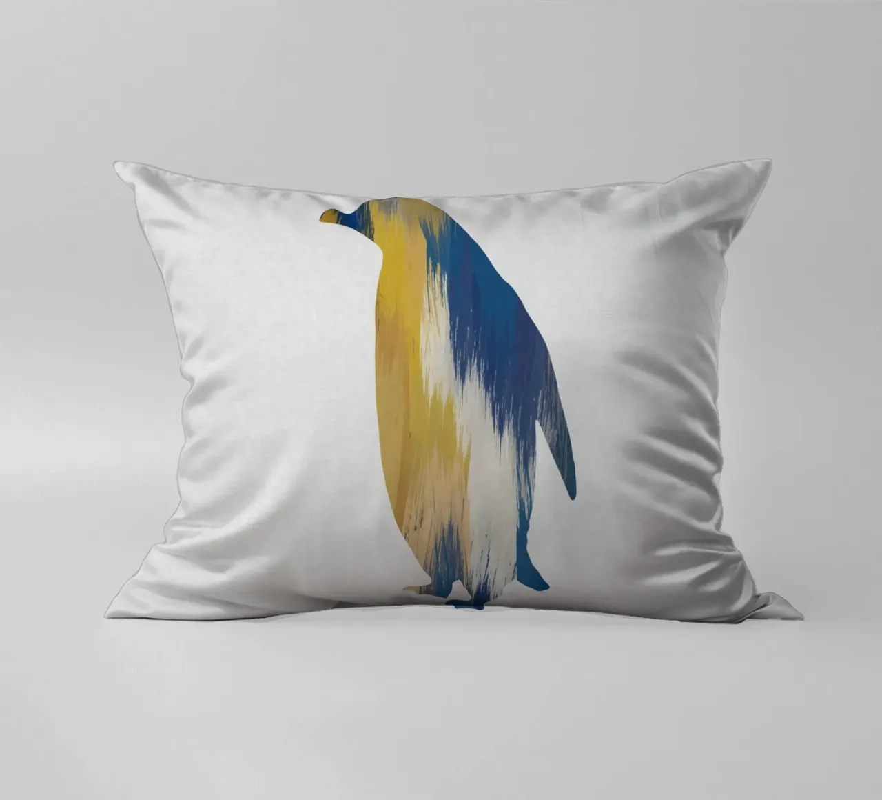 Pingouin bleu et jaune coussin de Orara Studio