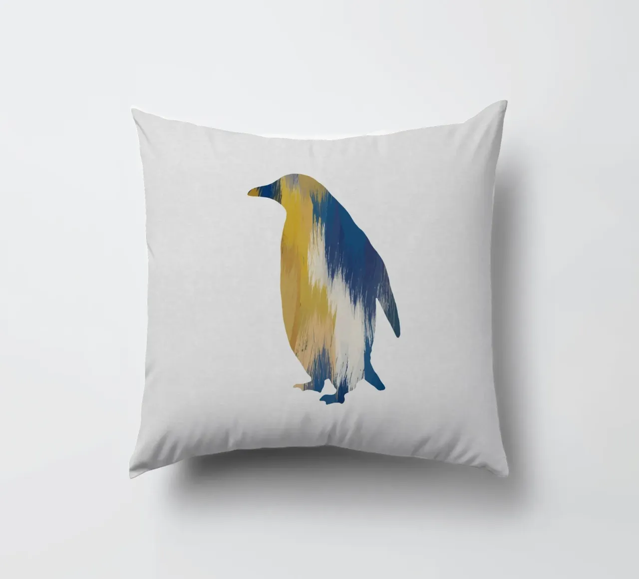 Pingouin bleu et jaune coussin de Orara Studio
