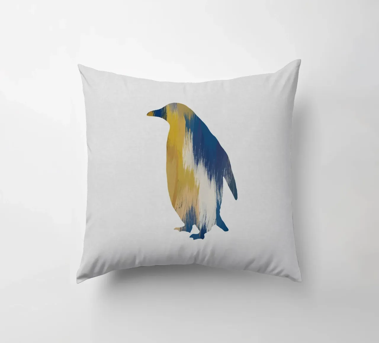 Pingouin bleu et jaune coussin de Orara Studio