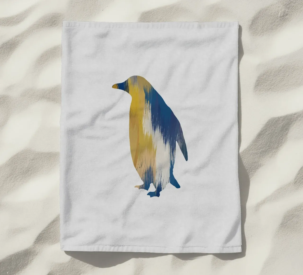 Pingouin bleu et jaune serviette de plage de Orara Studio