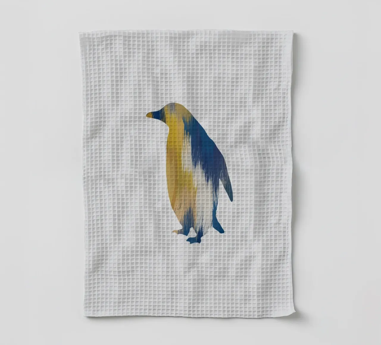 Pingouin bleu et jaune torchon de Orara Studio