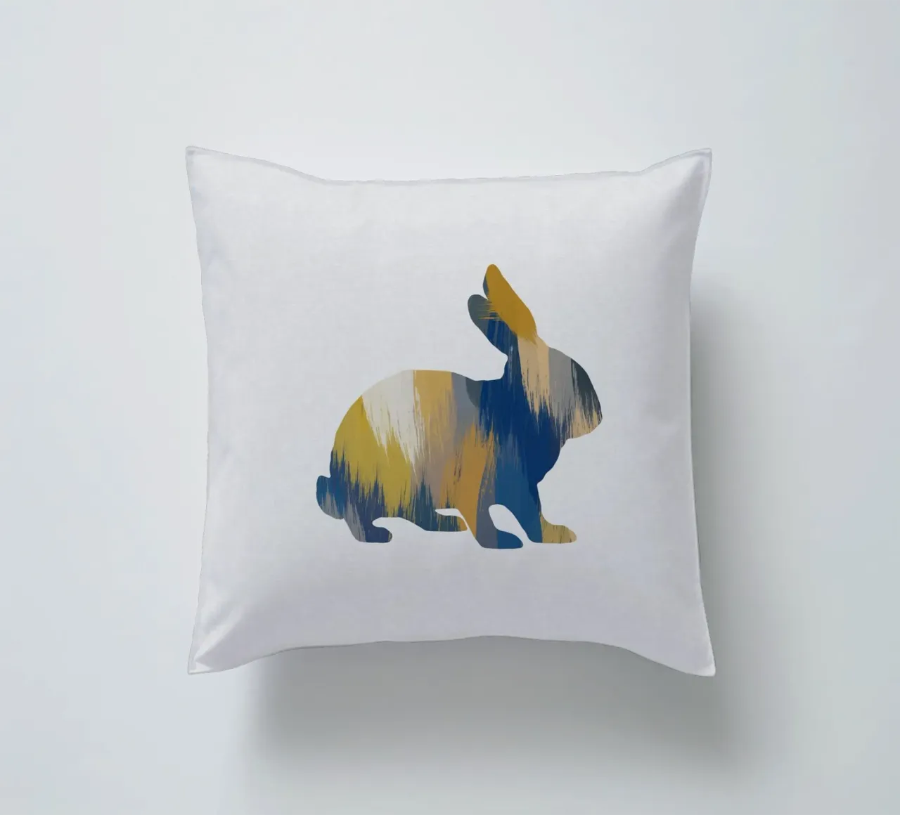 Lapin bleu et jaune coussin de Orara Studio