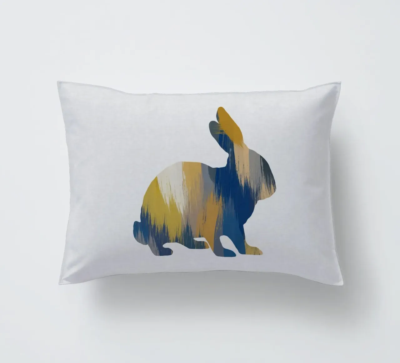 Lapin bleu et jaune coussin de Orara Studio