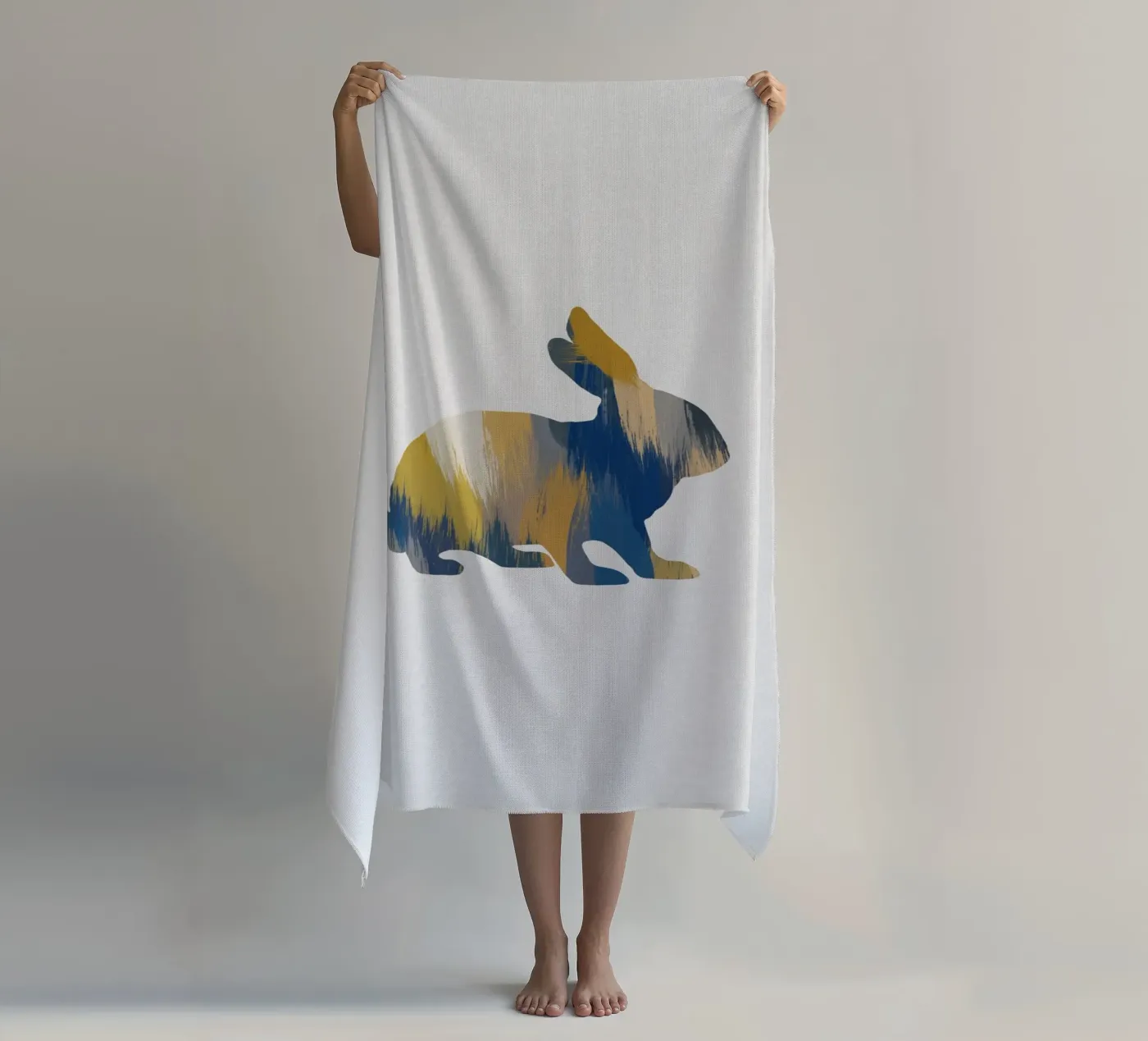 Coniglio blu e giallo telo mare da Orara Studio