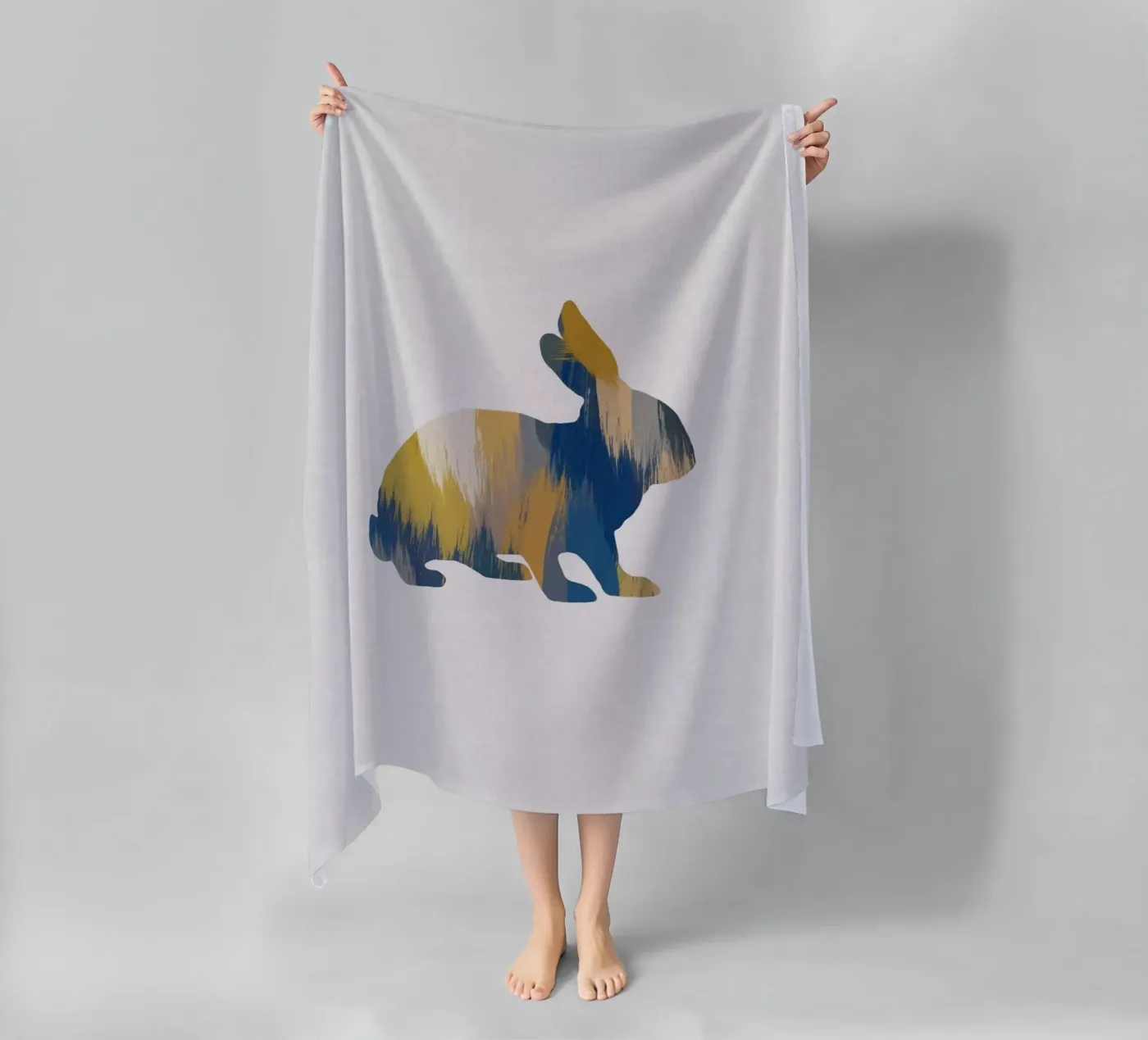 Coniglio blu e giallo telo mare da Orara Studio