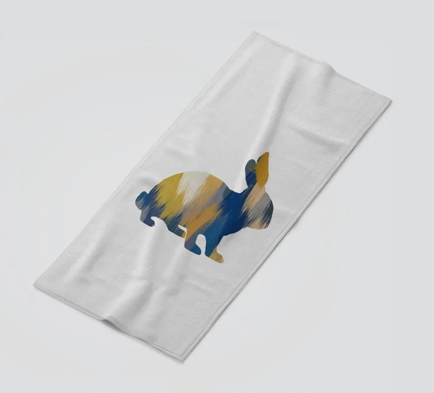 Coniglio blu e giallo telo mare da Orara Studio