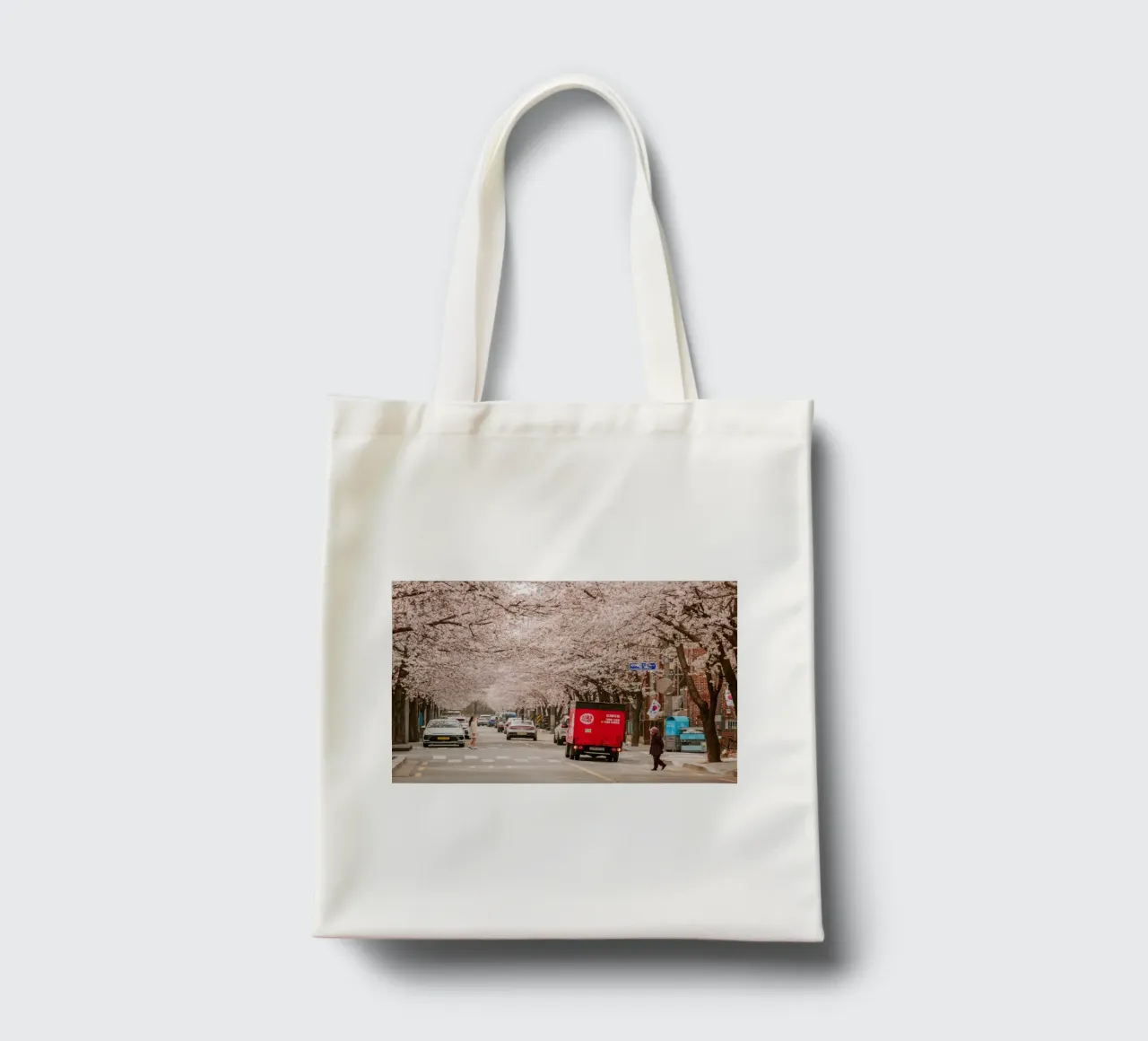 La via dei ciliegi in fiore a Seul, Corea del Sud borsa in juta da mbgraphx2