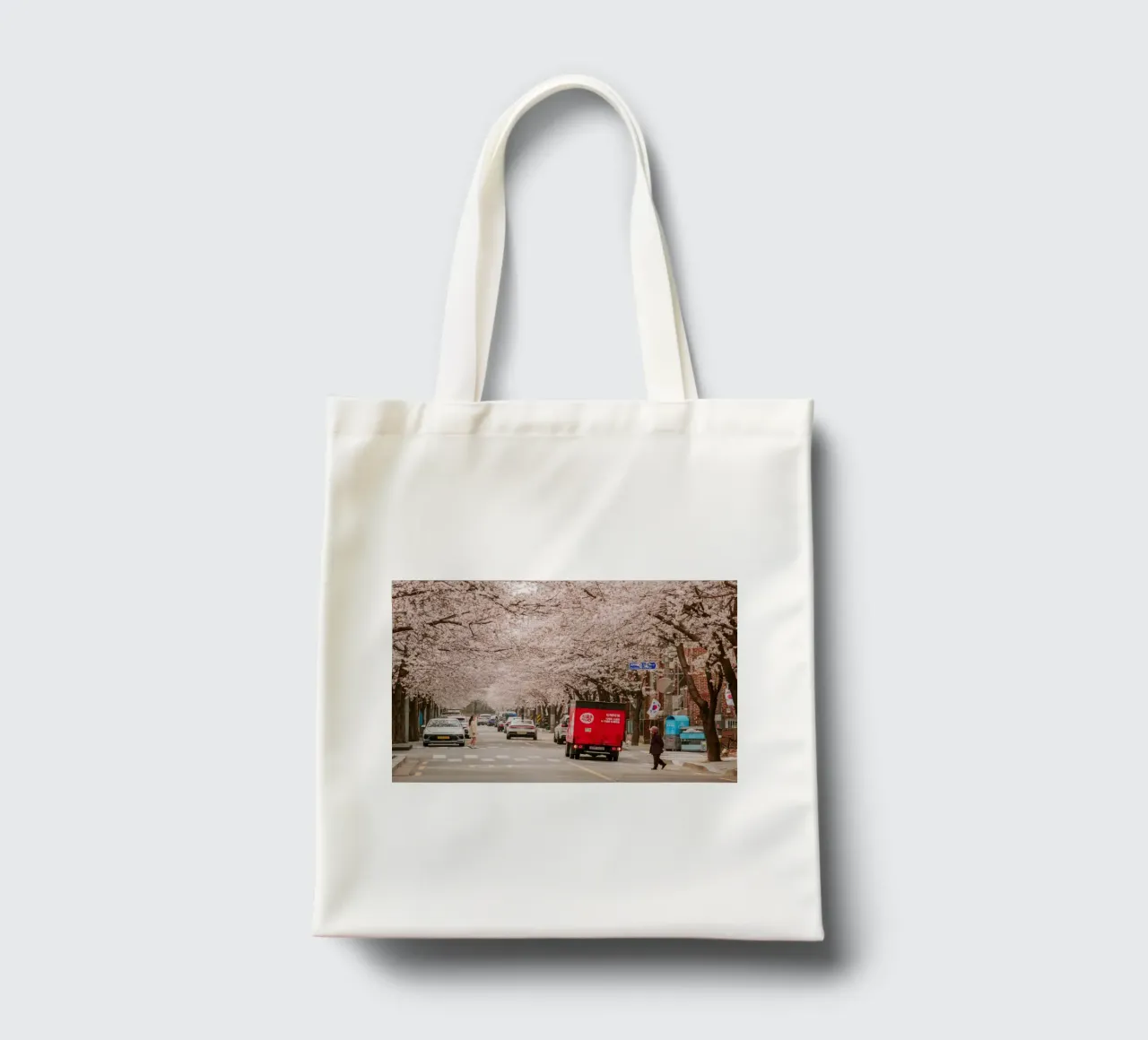 La via dei ciliegi in fiore a Seul, Corea del Sud borsa in juta da mbgraphx2