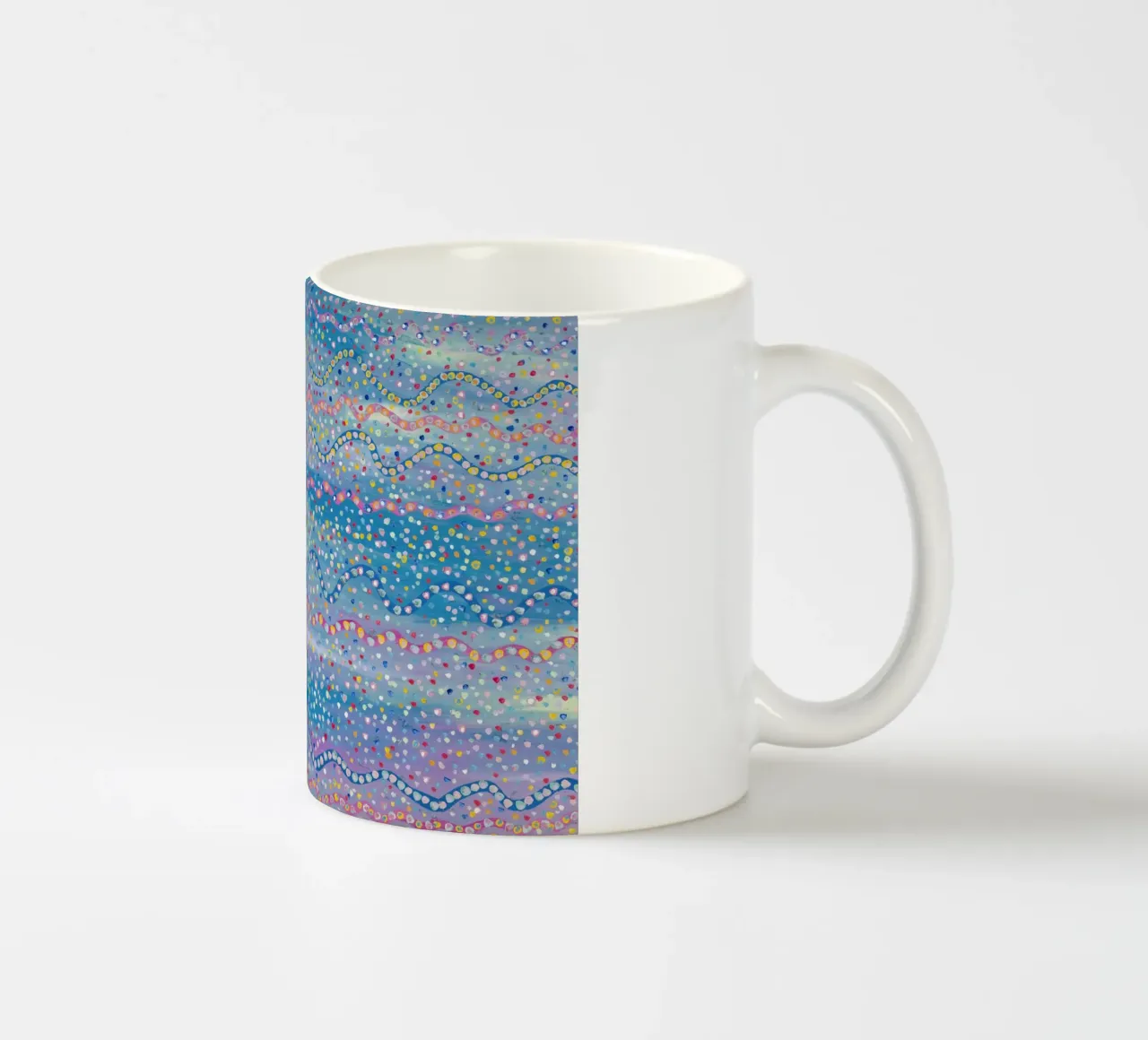 Colori divertenti tazza in ceramica da Helen Joynson