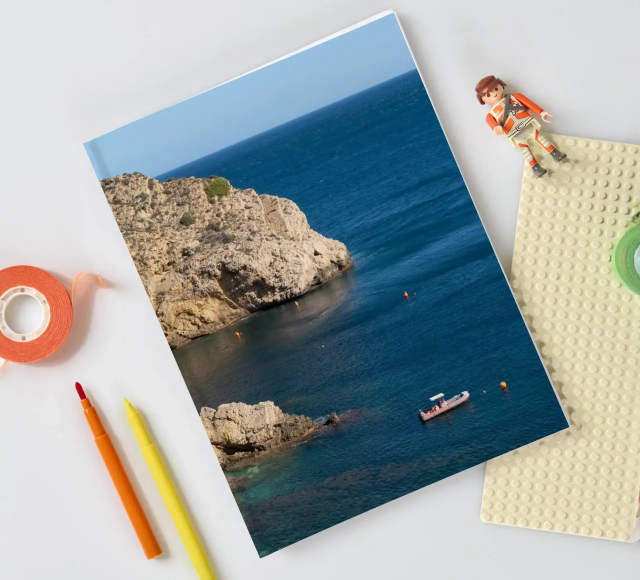 Blue sea and cliffs of Cap Prim in Jávea notebook by Adriana Mueller