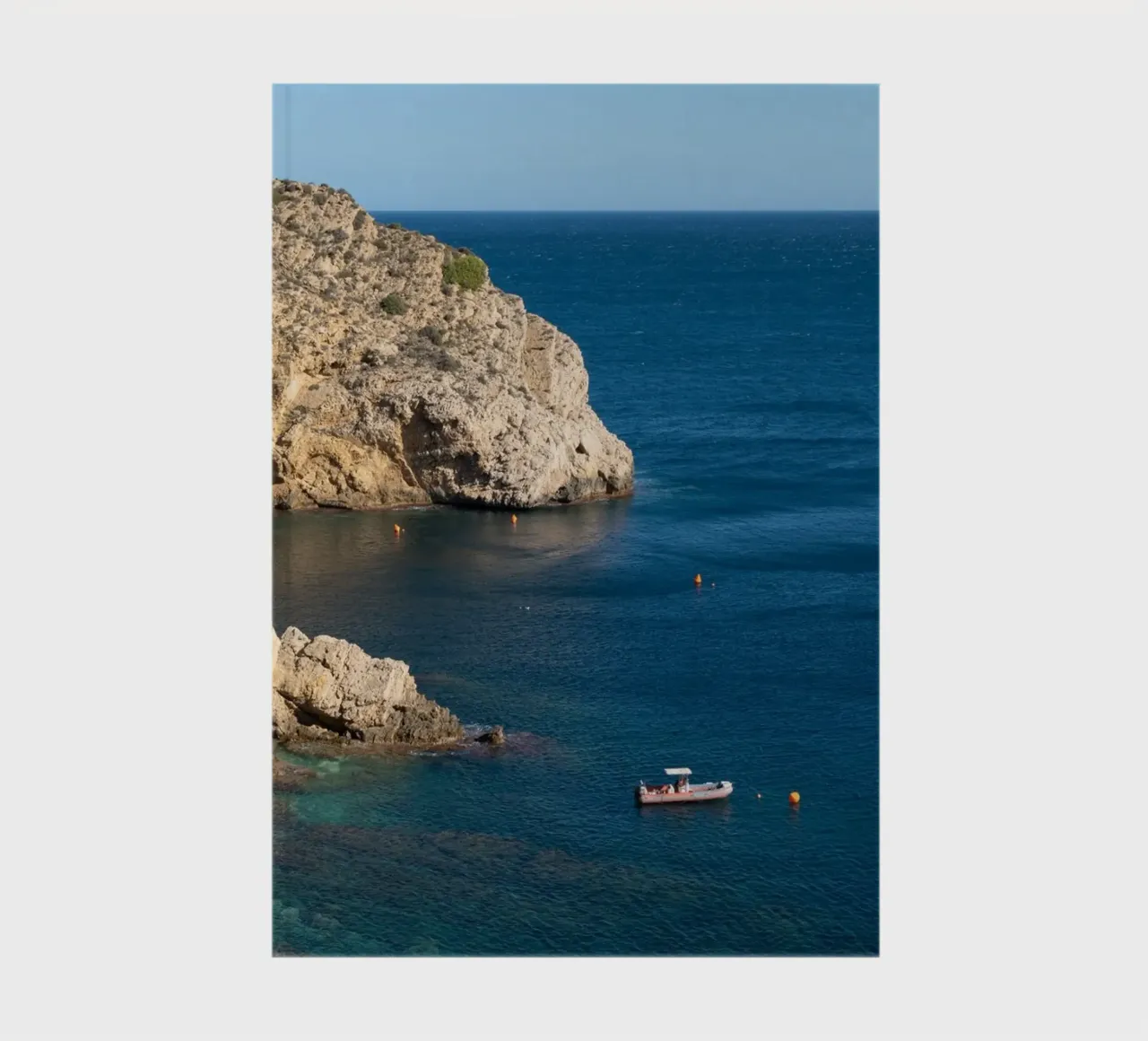 Blue sea and cliffs of Cap Prim in Jávea notebook by Adriana Mueller
