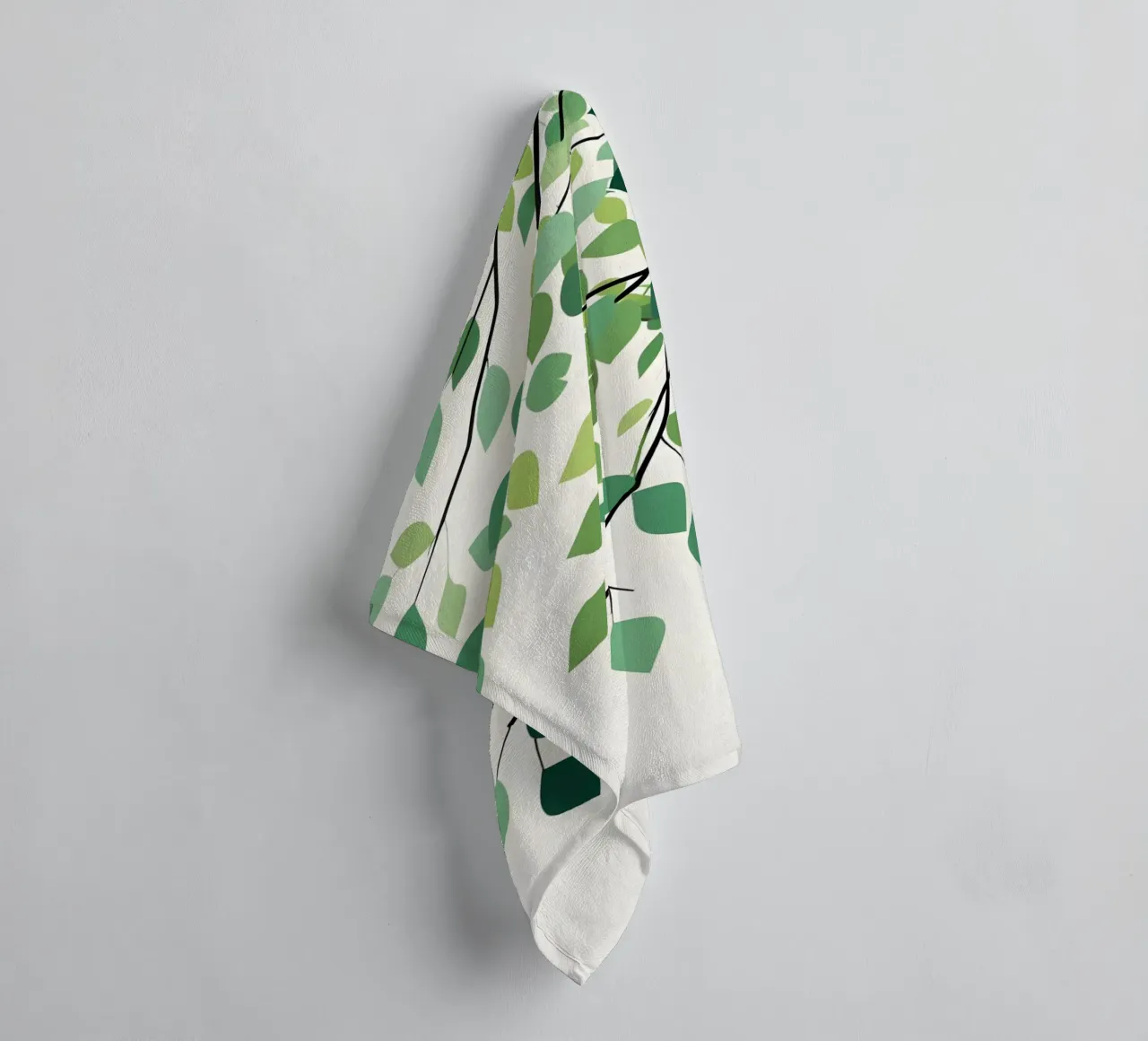 branch with droping leaf towel by botanical shop
