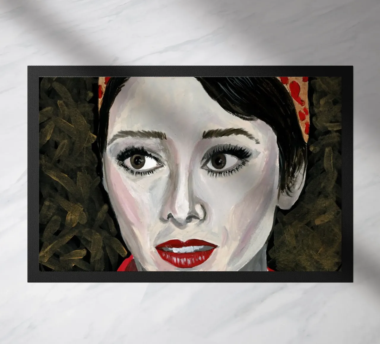 Audrey Hepburn in rosso zerbino da Interior Edit & House Staging