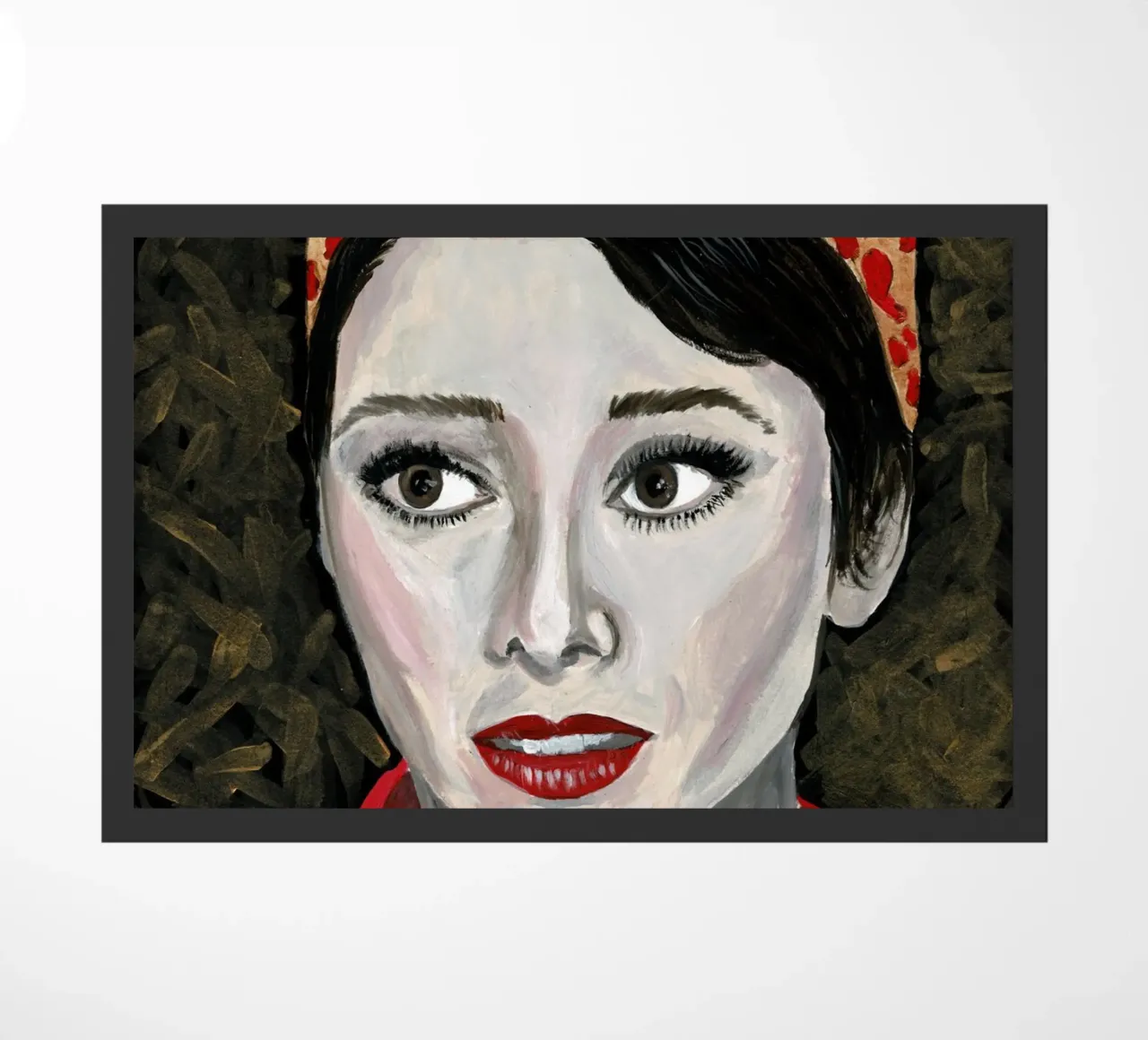 Audrey Hepburn in rosso zerbino da Interior Edit & House Staging