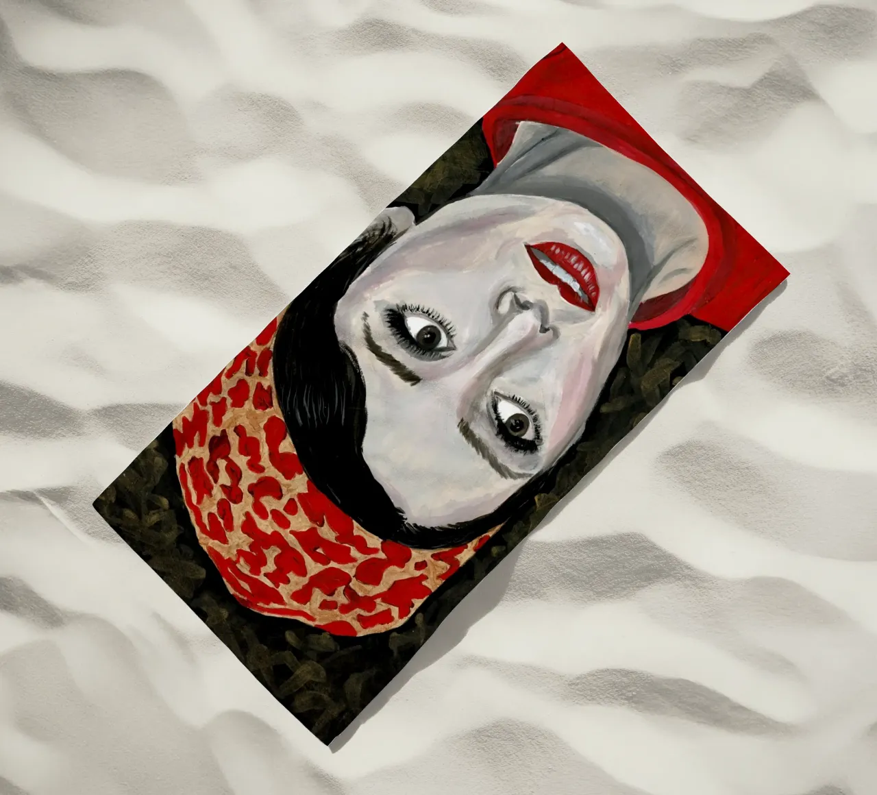 Audrey Hepburn in rosso telo mare da Interior Edit & House Staging