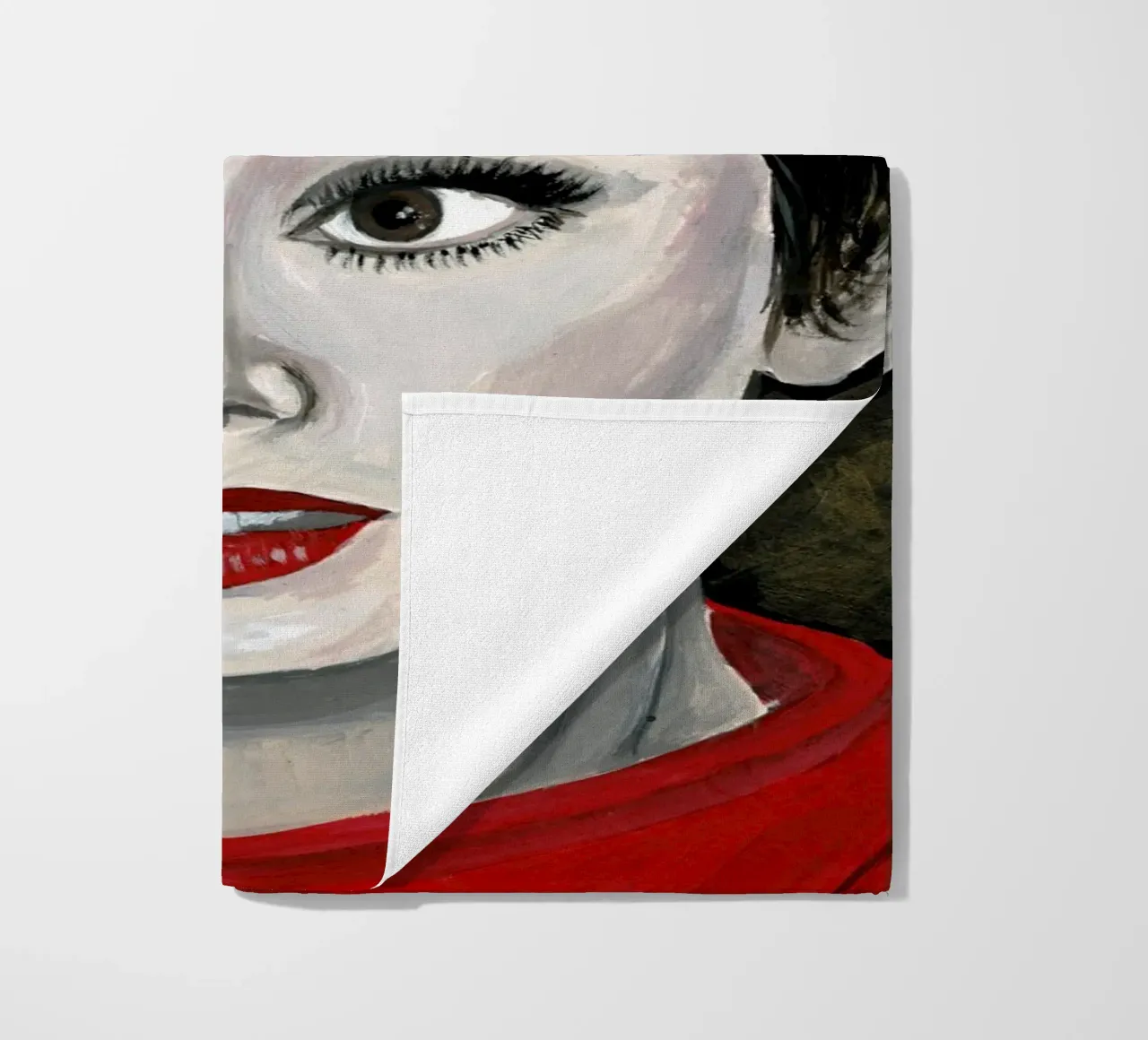 Audrey Hepburn in rosso telo mare da Interior Edit & House Staging