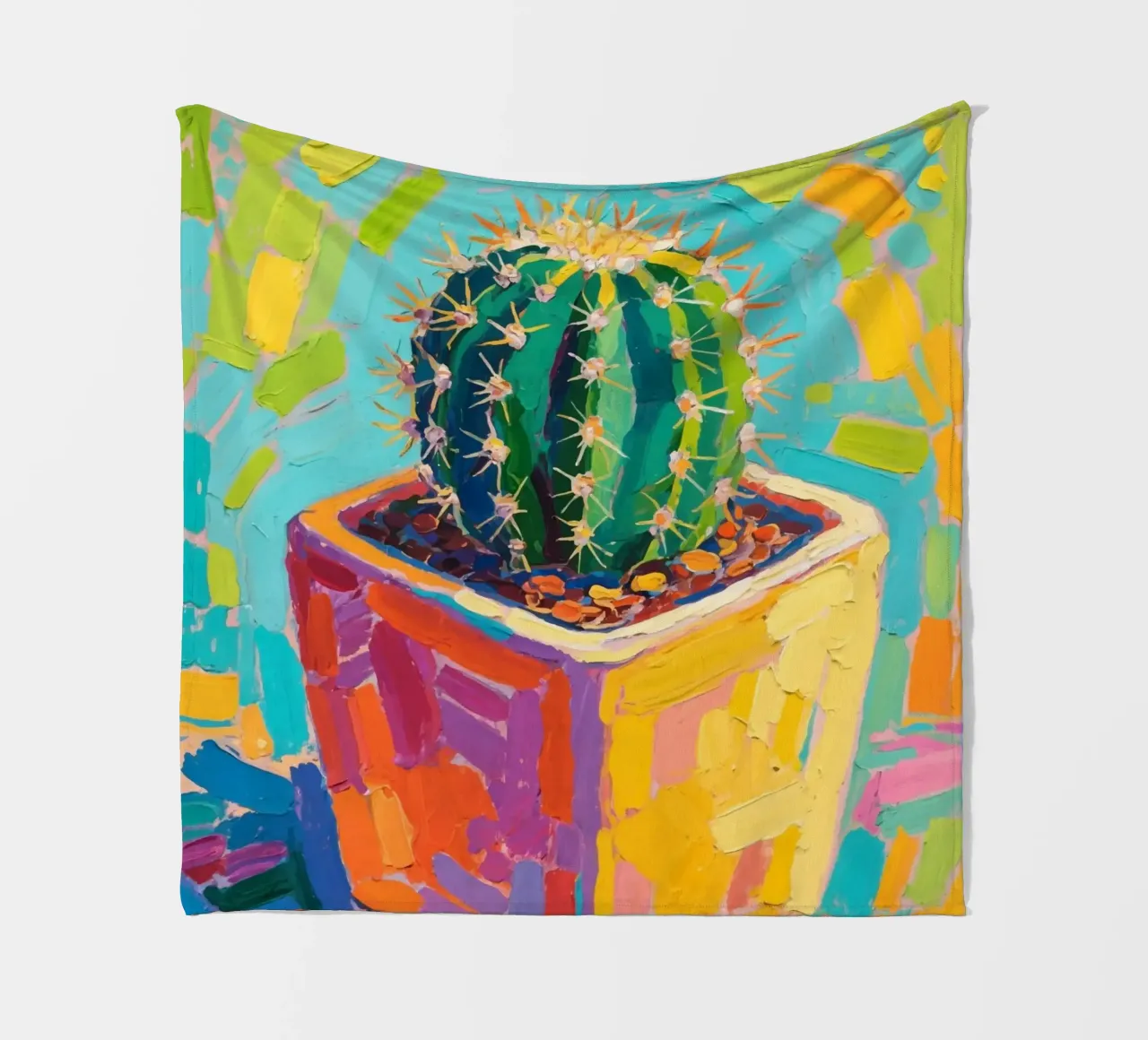 Piccolo cactus in un vaso a forma di cubo coperta in pile da Slash Shop