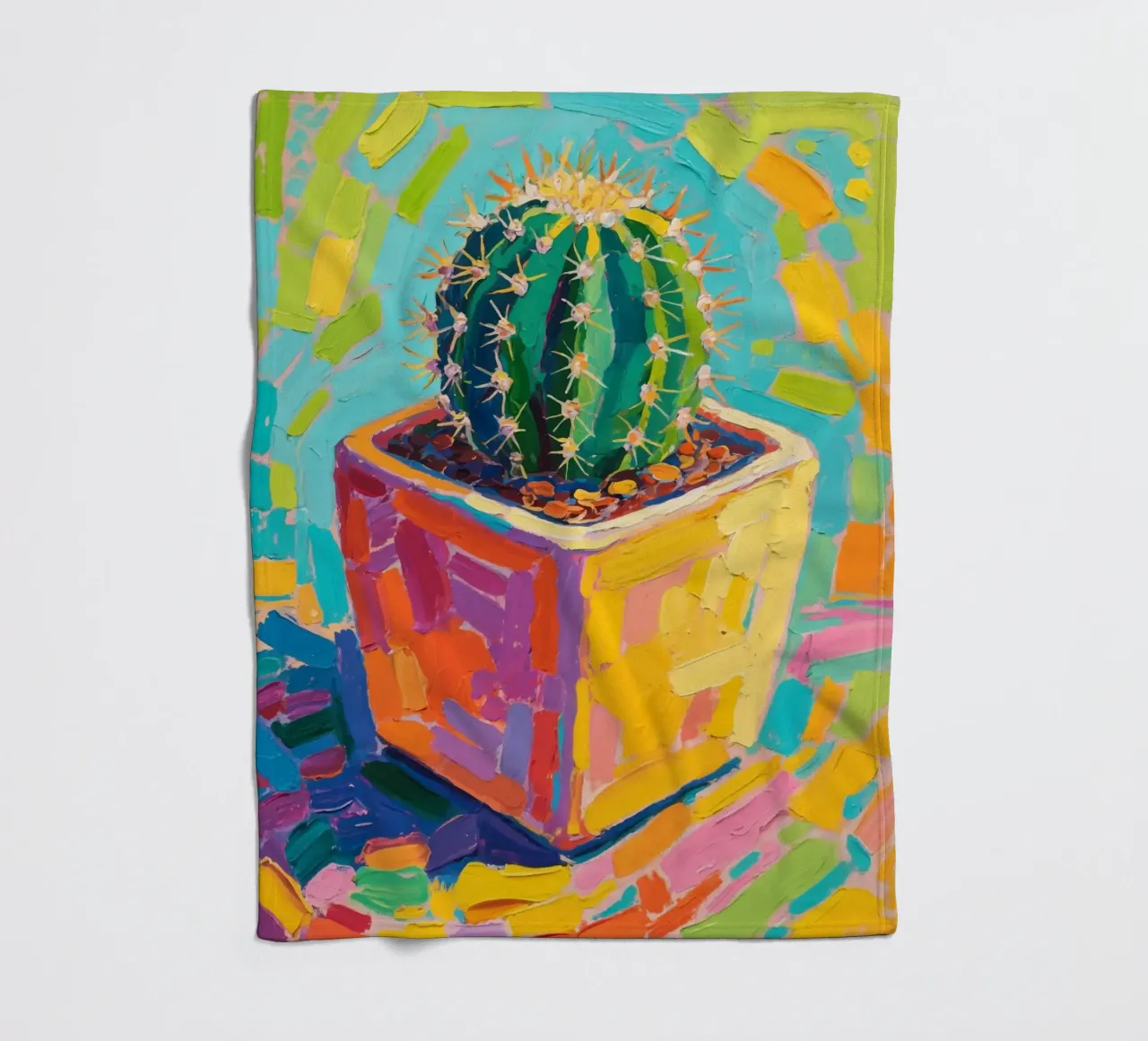 Piccolo cactus in un vaso a forma di cubo coperta in pile da Slash Shop