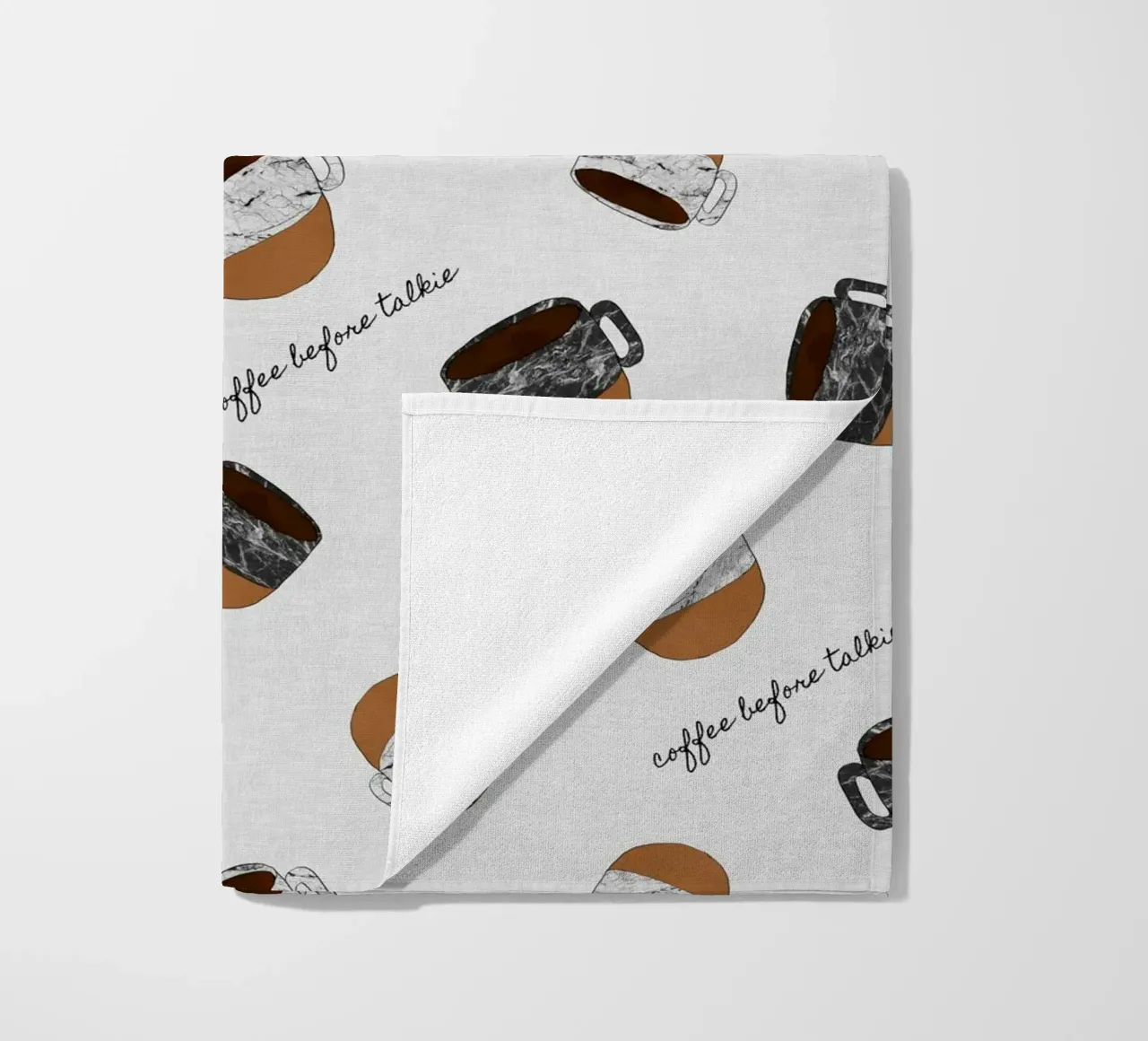 Caffè prima di parlare telo mare da Orara Studio