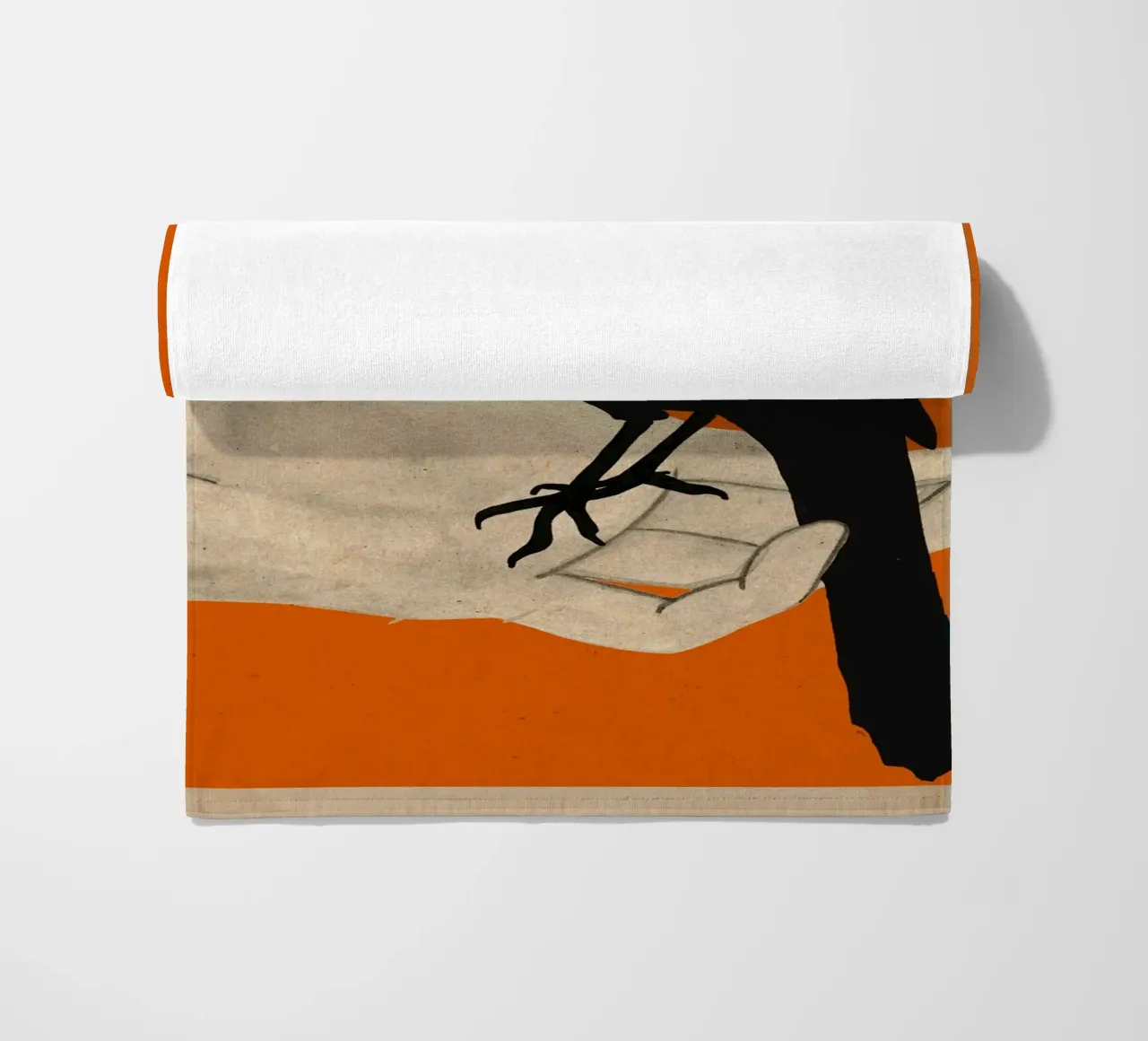 Uccello in mano telo mare da M.A.Z.U.N.