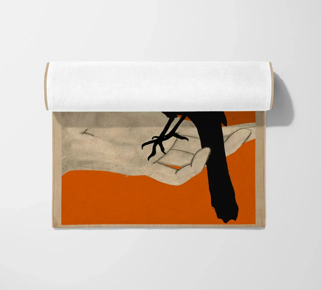 Uccello in mano telo mare da M.A.Z.U.N.