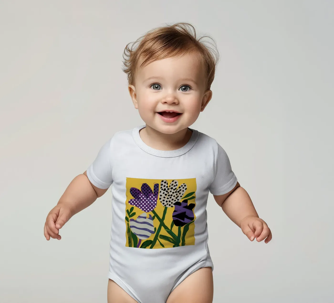 Abstract Garden Patchwork short-sleeve baby romper by Sky Velour