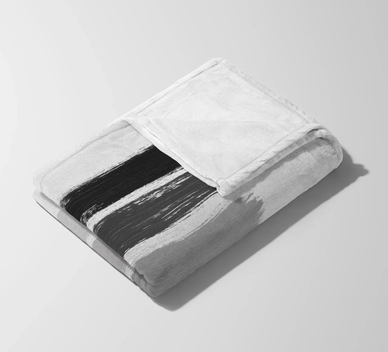 Strisce bianche e nere coperta in pile da Orara Studio
