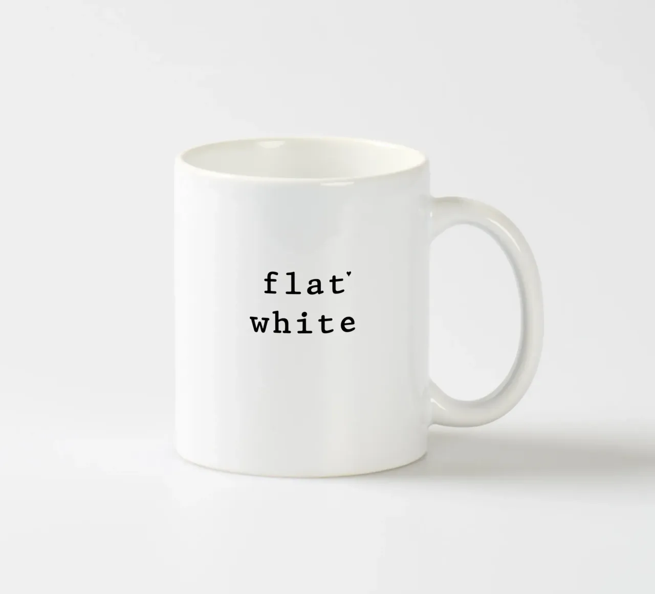 Flat white ceramic mug by typolover
