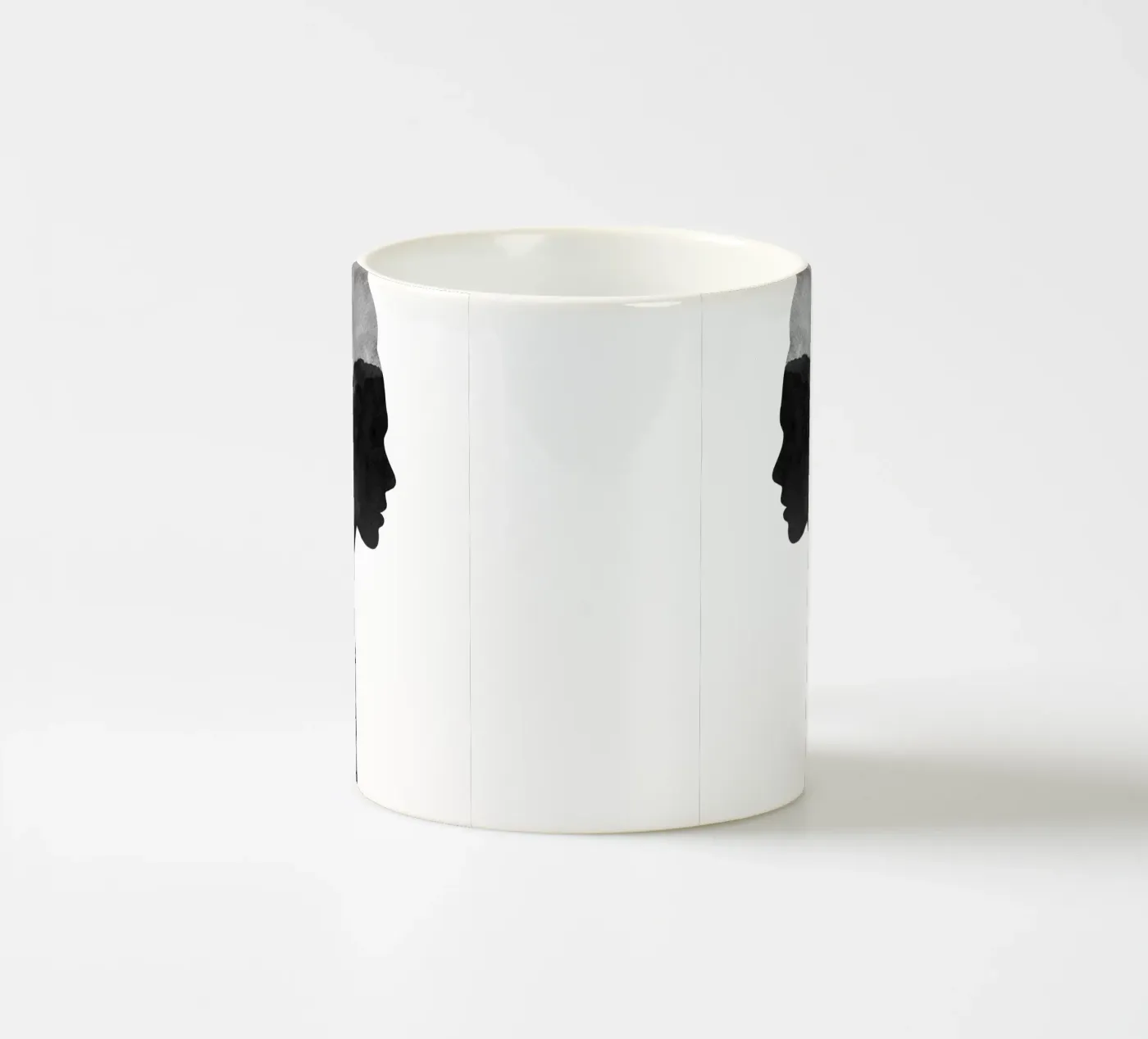 Her ceramic mug by Orara Studio