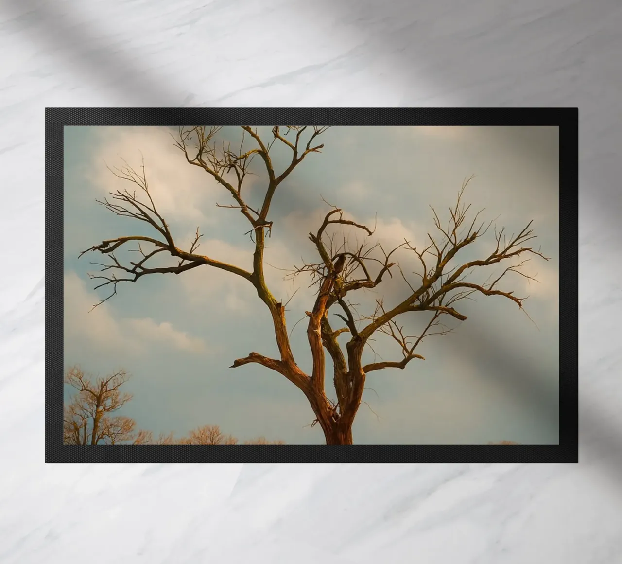 single dry tree doormat by Maraza