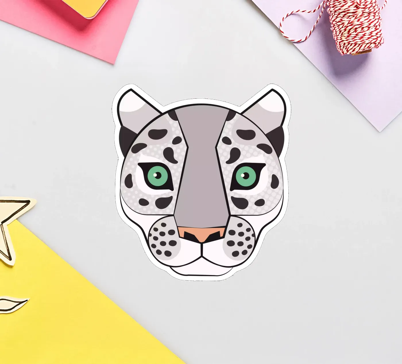 Snow Leopard sticker by Lidia Blomgren