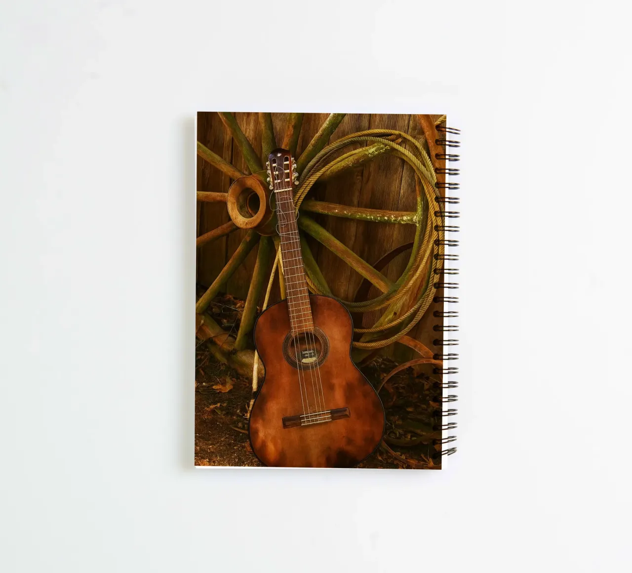 old guitar with broken strings spiral notebook by Deemoll