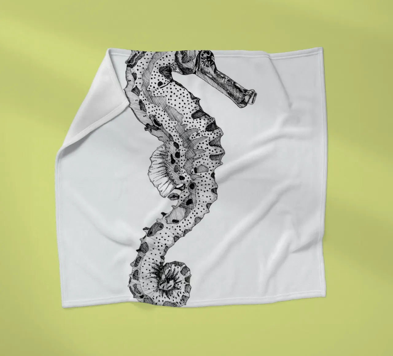 The Seahorse fleece blanket by Mathilde Olsen