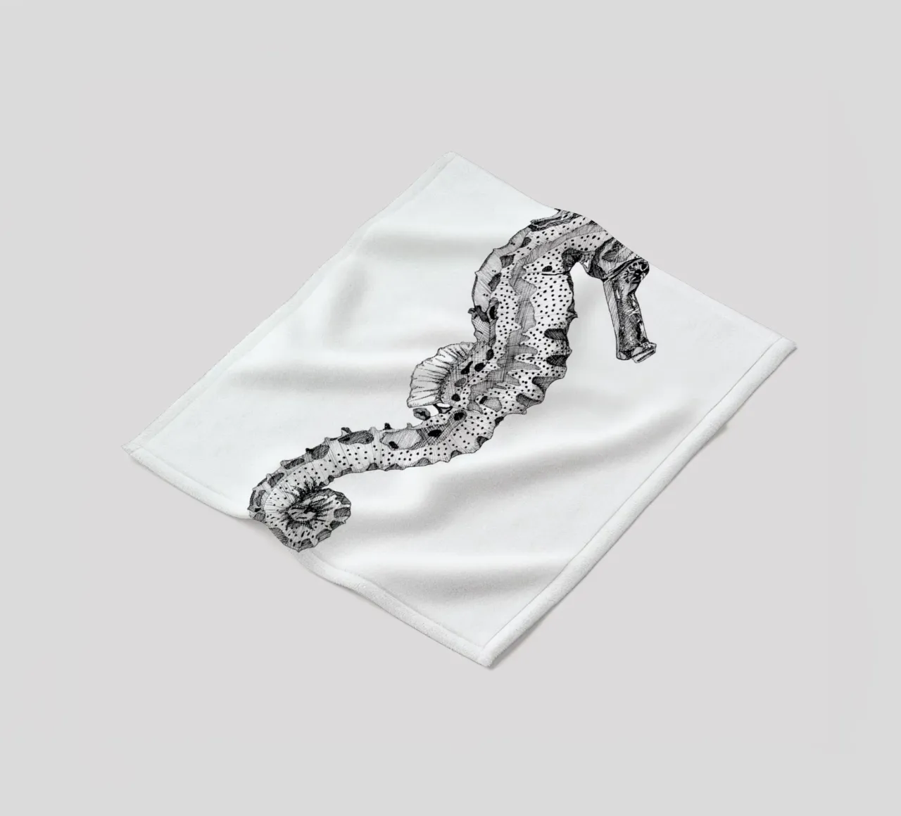The Seahorse fleece blanket by Mathilde Olsen