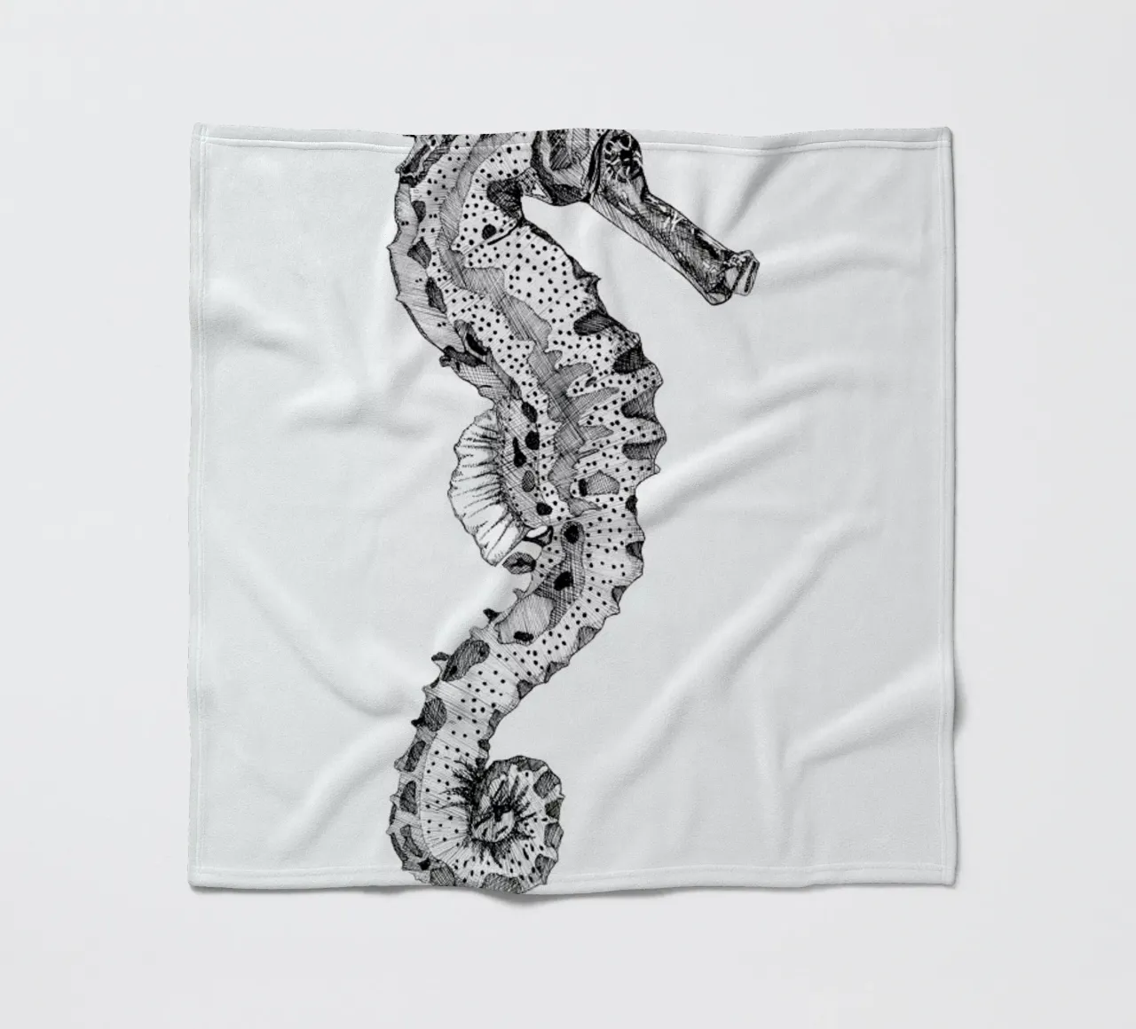 The Seahorse fleece blanket by Mathilde Olsen